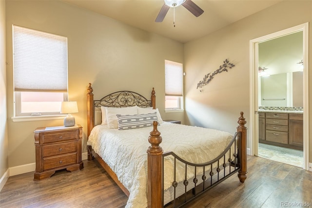 3012 Cathedral Park Vw, Colorado Springs, CO 80904 - bedroom featuring wood finished floors, ensuite bathroom, and ceiling fan