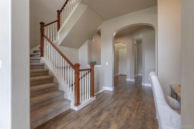 3012 Cathedral Park Vw, Colorado Springs, CO 80904 - stairs with wood finished floors and arched walkways