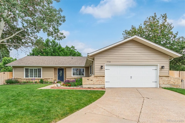 7719 S Jackson Cir, Centennial, CO 80122 - ranch-style home featuring brick siding, concrete driveway, and a garage