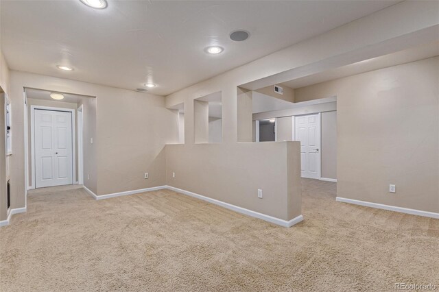 7719 S Jackson Cir, Centennial, CO 80122 - finished below grade area featuring light colored carpet and recessed lighting