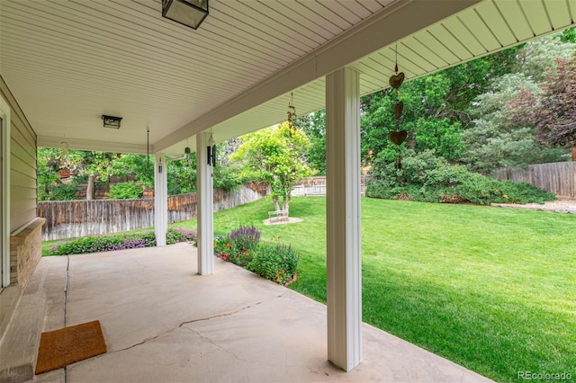 7719 S Jackson Cir, Centennial, CO 80122 - fenced backyard featuring a patio area