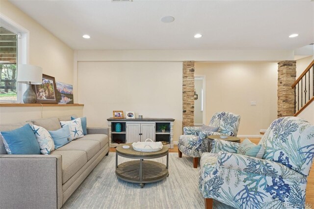 8528 Winter Berry Dr, Castle Pines, CO 80108 - living room with visible vents, baseboards, recessed lighting, wood finished floors, and stairs