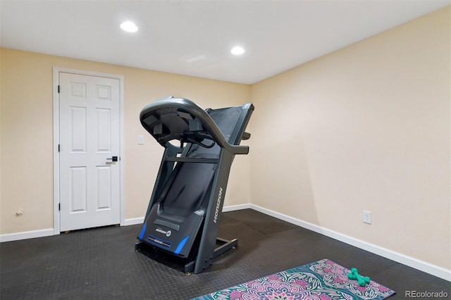 8528 Winter Berry Dr, Castle Pines, CO 80108 - exercise room featuring recessed lighting, dark colored carpet, and baseboards