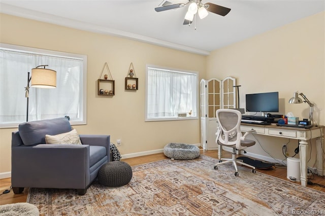 8528 Winter Berry Dr, Castle Pines, CO 80108 - office space featuring wood finished floors, baseboards, and ceiling fan
