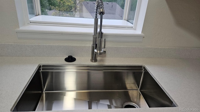 18531 E Tanforan Pl, Aurora, CO 80015 - kitchen view of a sink and light countertops