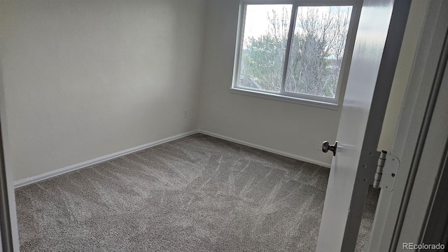 18531 E Tanforan Pl, Aurora, CO 80015 - spare room featuring carpet floors and baseboards