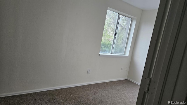18531 E Tanforan Pl, Aurora, CO 80015 - spare room featuring carpet flooring, plenty of natural light, and baseboards