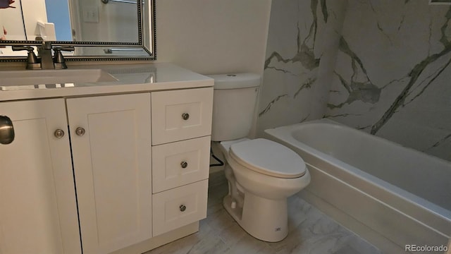 18531 E Tanforan Pl, Aurora, CO 80015 - bathroom featuring toilet, vanity, and marble finish flooring