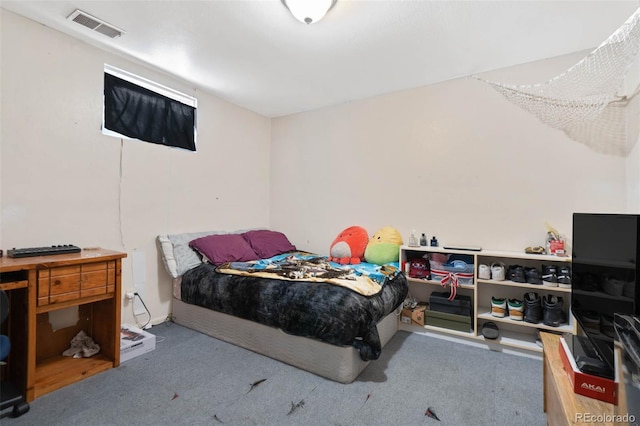 carpeted bedroom with visible vents