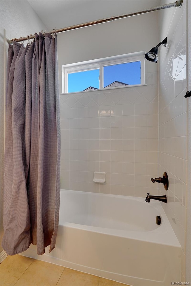 bathroom featuring shower / bath combo and tile patterned floors