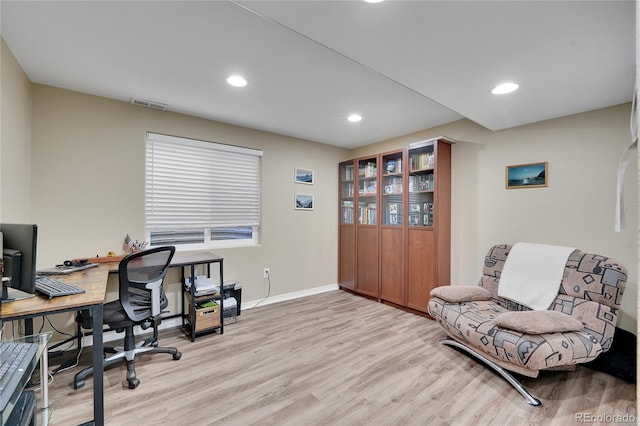 home office featuring light hardwood / wood-style floors