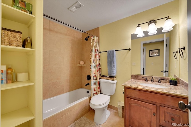 full bathroom with shower / bath combination with curtain, tile patterned floors, vanity, a textured ceiling, and toilet