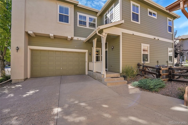 view of front of property with a garage