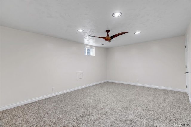 spare room featuring recessed lighting, carpet flooring, baseboards, and ceiling fan