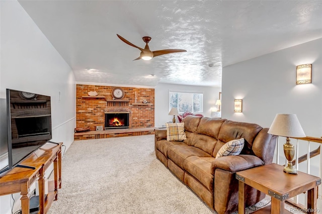 3630 W Saratoga Ave, Littleton, CO 80123 - carpeted living area with a brick fireplace and ceiling fan