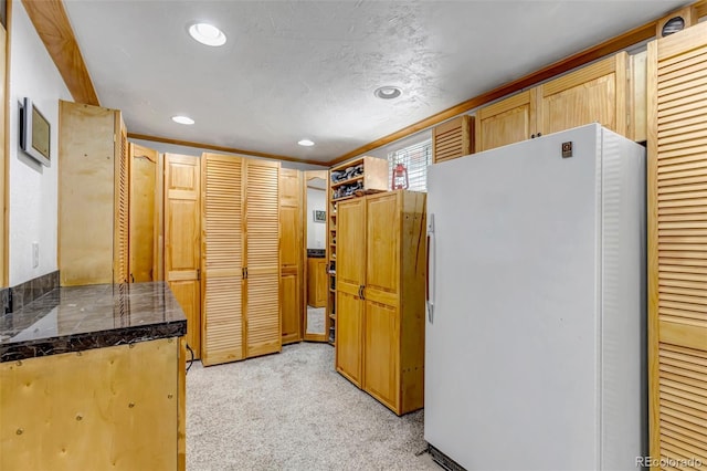3630 W Saratoga Ave, Littleton, CO 80123 - kitchen featuring freestanding refrigerator, tile countertops, light carpet, and recessed lighting