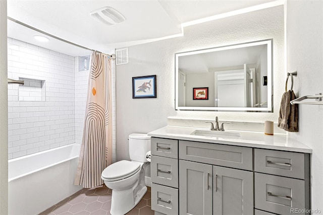 12256 W 34th Pl, Wheat Ridge, CO 80033 - full bathroom featuring toilet, vanity, shower / bath combination with curtain, a textured wall, and tile patterned flooring