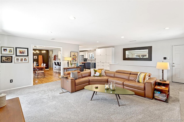 12256 W 34th Pl, Wheat Ridge, CO 80033 - living area with light colored carpet, baseboards, and recessed lighting