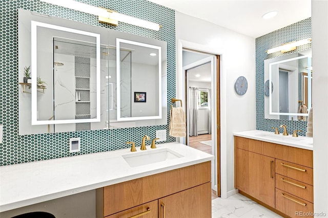 12256 W 34th Pl, Wheat Ridge, CO 80033 - bathroom with marble finish floors, two vanities, backsplash, recessed lighting, and a shower