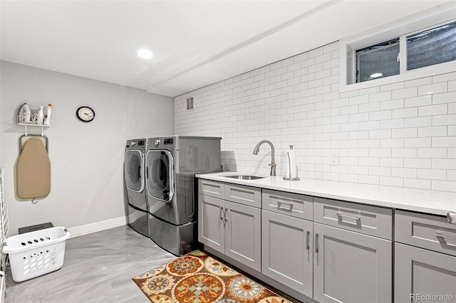 12256 W 34th Pl, Wheat Ridge, CO 80033 - laundry area with washing machine and dryer, cabinet space, baseboards, and recessed lighting