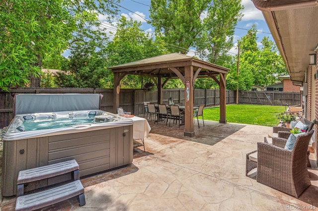 12256 W 34th Pl, Wheat Ridge, CO 80033 - view of patio / terrace featuring a hot tub, a gazebo, and outdoor dining area