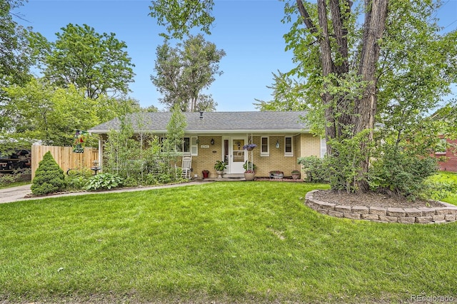6940 W 63rd Ave, Arvada, CO 80003 - ranch-style house with brick siding and a shingled roof