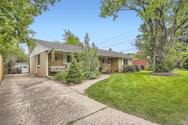 6940 W 63rd Ave, Arvada, CO 80003 - ranch-style house featuring a front yard and brick siding
