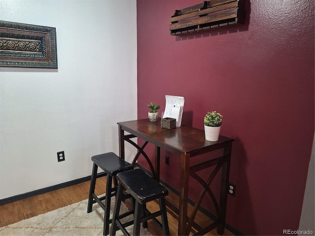 dining space featuring hardwood / wood-style flooring