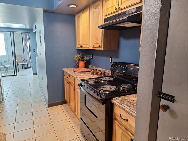 kitchen with light stone countertops, black electric range oven, light tile patterned flooring, and light brown cabinetry