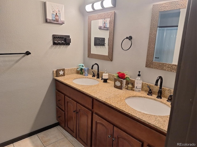 bathroom with vanity and tile patterned floors