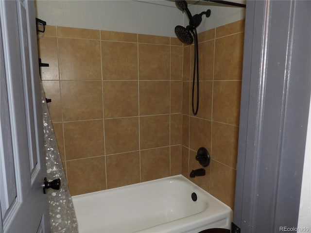 bathroom with shower / tub combo