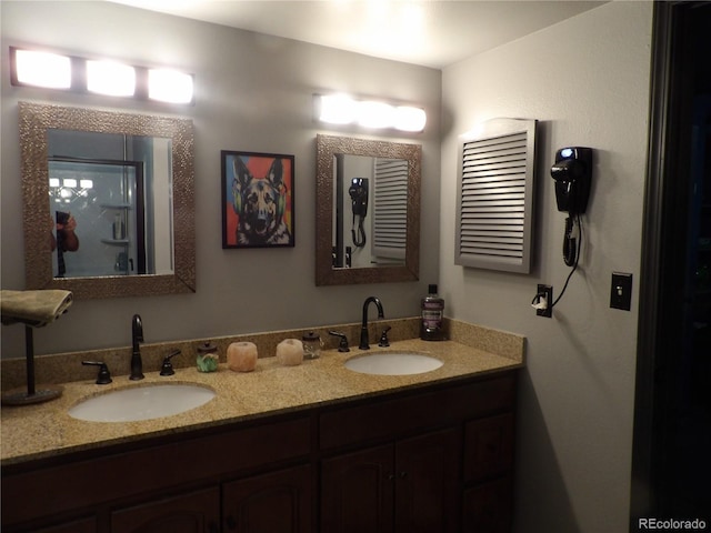 full bath featuring double vanity and a sink