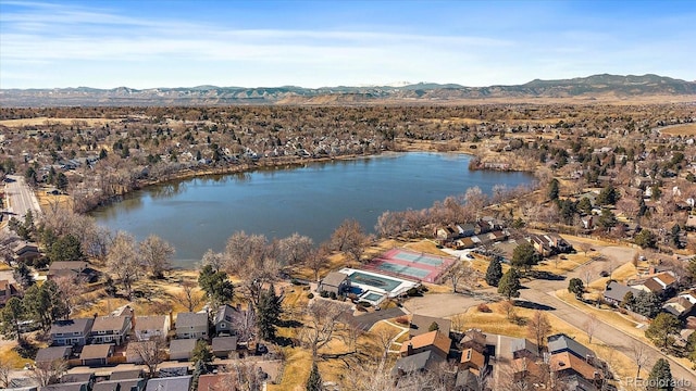 aerial view featuring a residential view and a water and mountain view