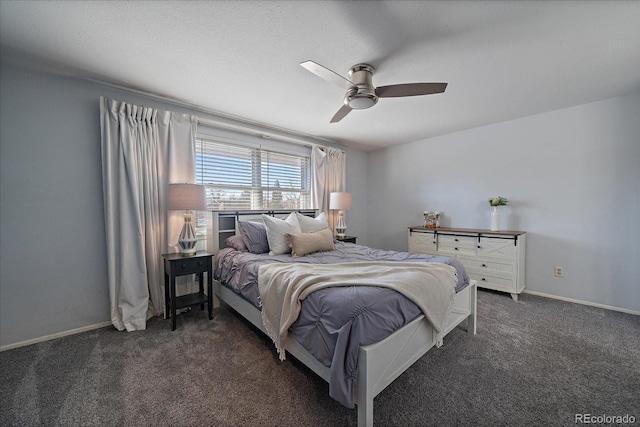 carpeted bedroom featuring a ceiling fan and baseboards