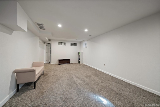 unfurnished room with baseboards, carpet flooring, visible vents, and recessed lighting