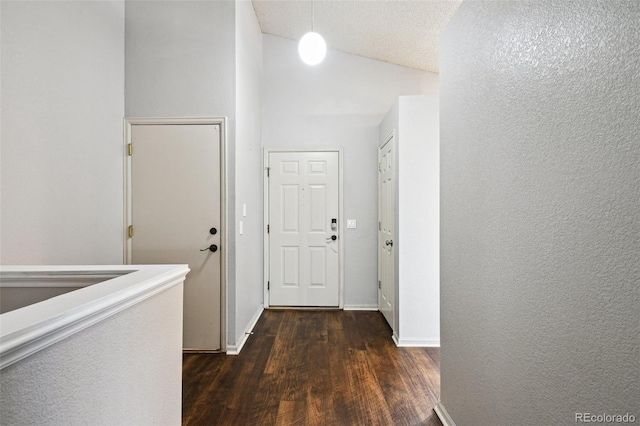 corridor featuring dark hardwood / wood-style floors