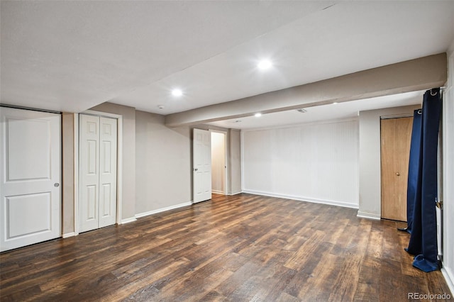 basement with dark wood-type flooring