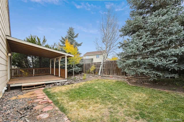 view of yard featuring a deck