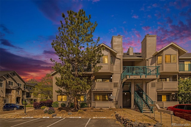 view of outdoor building at dusk