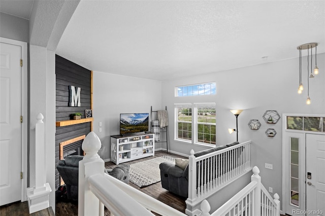 1464 Nemrick Pl, Castle Rock, CO 80109 - living area with wood finished floors and a fireplace