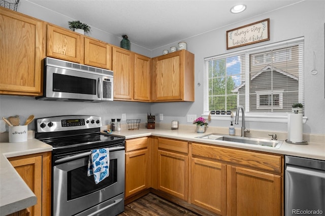 1464 Nemrick Pl, Castle Rock, CO 80109 - kitchen with stainless steel appliances, a sink, light countertops, and recessed lighting