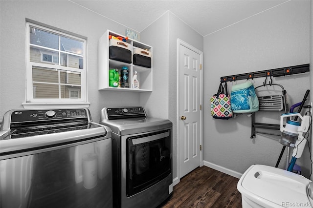 1464 Nemrick Pl, Castle Rock, CO 80109 - laundry room featuring washer and dryer, dark wood-style flooring, baseboards, and a textured ceiling