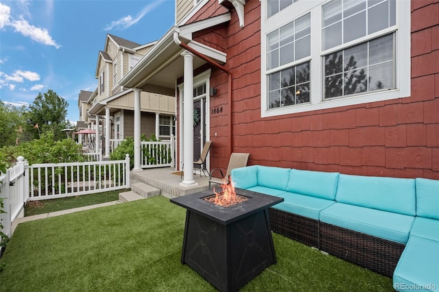 1464 Nemrick Pl, Castle Rock, CO 80109 - covered porch featuring an outdoor living space with a fire pit