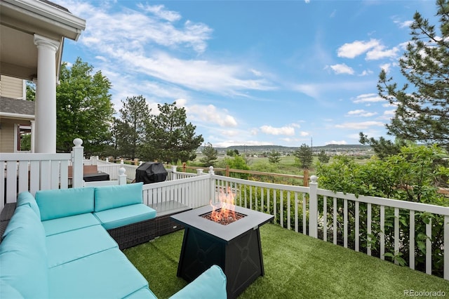 1464 Nemrick Pl, Castle Rock, CO 80109 - wooden terrace with an outdoor living space with a fire pit and a lawn