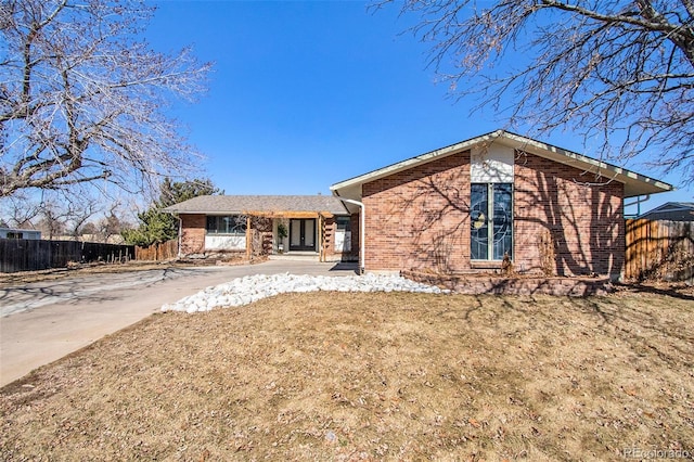 8895 E Radcliff Ave E, Denver, CO 80237 - ranch-style house featuring brick siding and fence