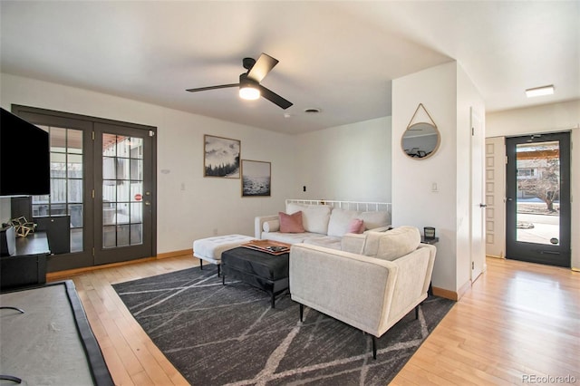 8895 E Radcliff Ave E, Denver, CO 80237 - living area with plenty of natural light, wood-type flooring, and ceiling fan