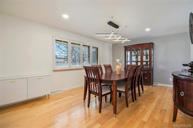 8895 E Radcliff Ave E, Denver, CO 80237 - dining space featuring light wood-style floors, recessed lighting, and baseboards