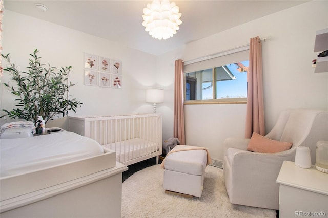 8895 E Radcliff Ave E, Denver, CO 80237 - bedroom with a crib