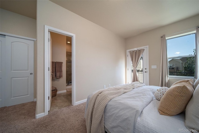 bedroom with light carpet, access to exterior, and baseboards