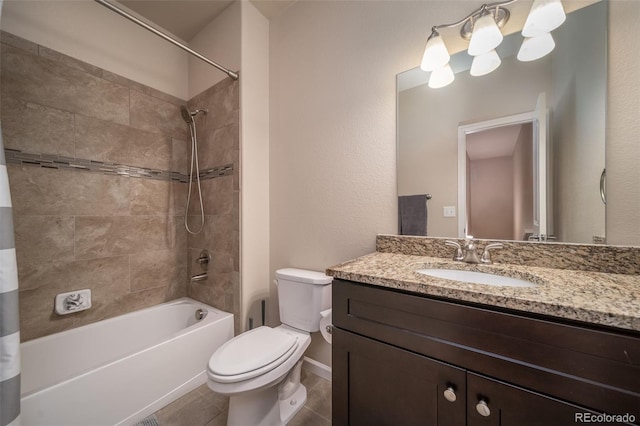 full bath with shower / washtub combination, tile patterned flooring, vanity, and toilet